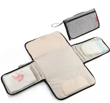 CAMBIADOR DE BEBE PLEGABLE CON COMPARTIMIENTOS 600112